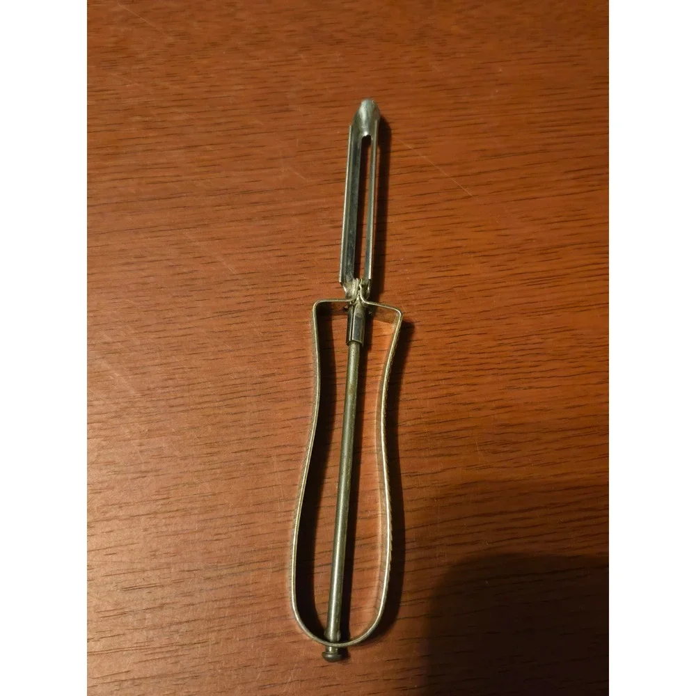 Vintage Metal Swivel Blade Potato Peeler Textured Handle Silver Tone